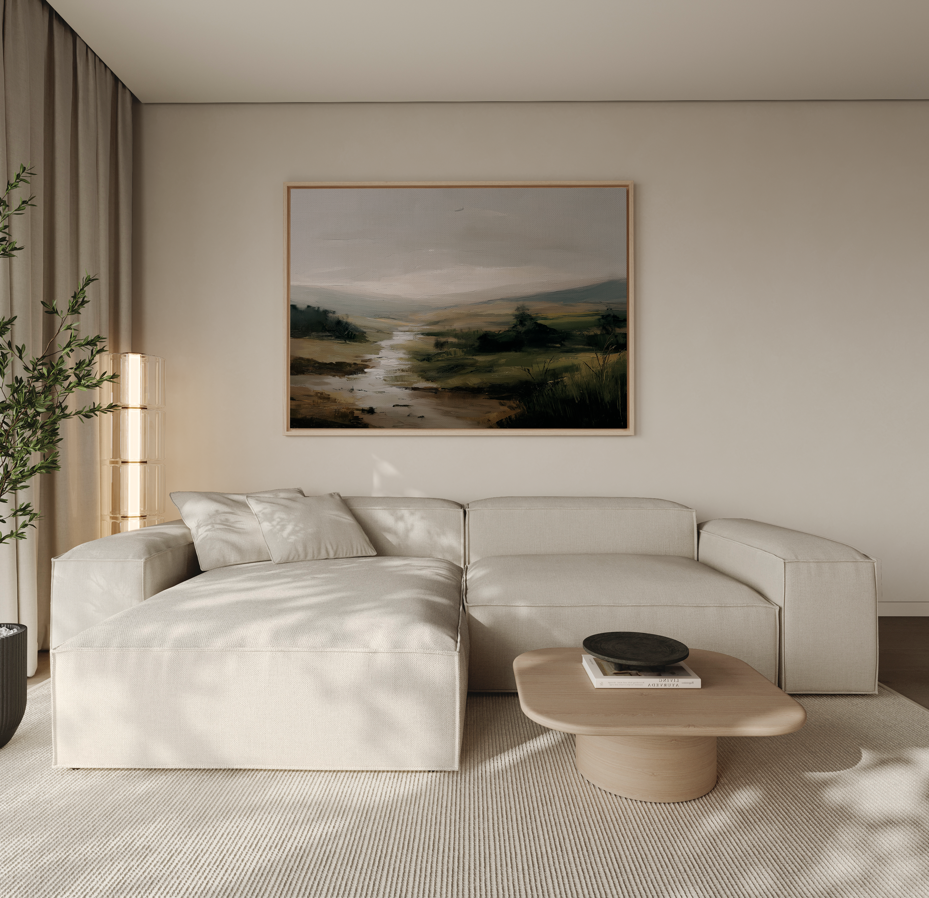 Modern living room with a beige sectional sofa, coffee table, and landscape painting.